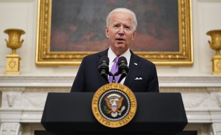Biden signs burst of virus orders, vows ‘Help is on the way’