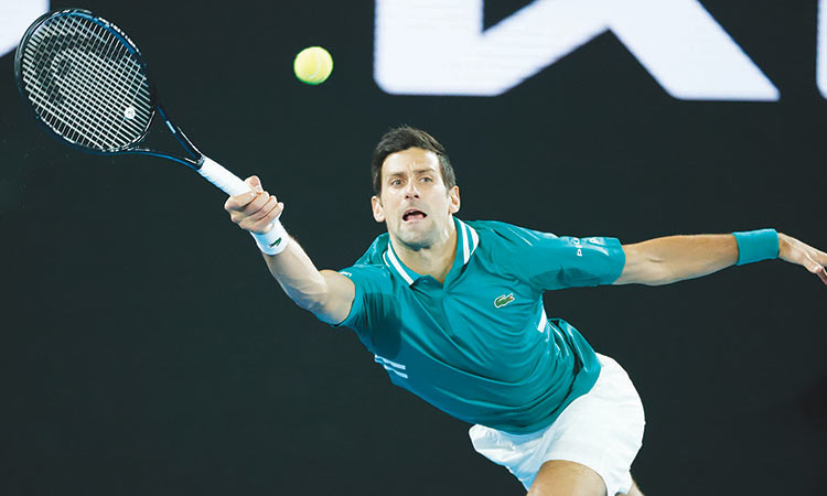 Djokovic fires as virus-delayed Australian Open gets underway