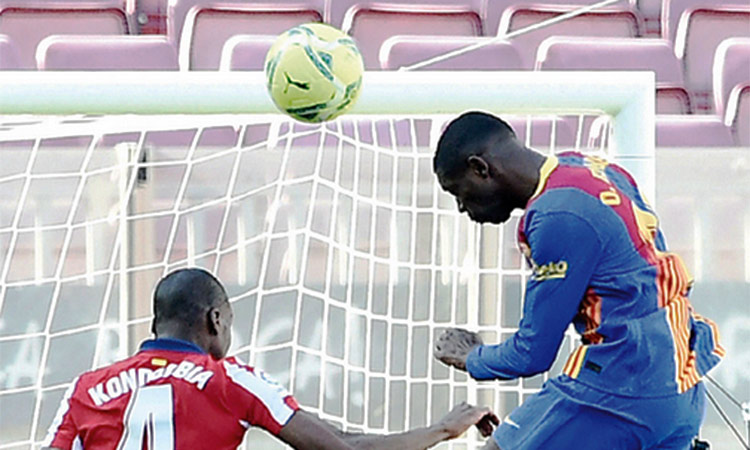 Barcelona and Atletico draw to give Real title advantage