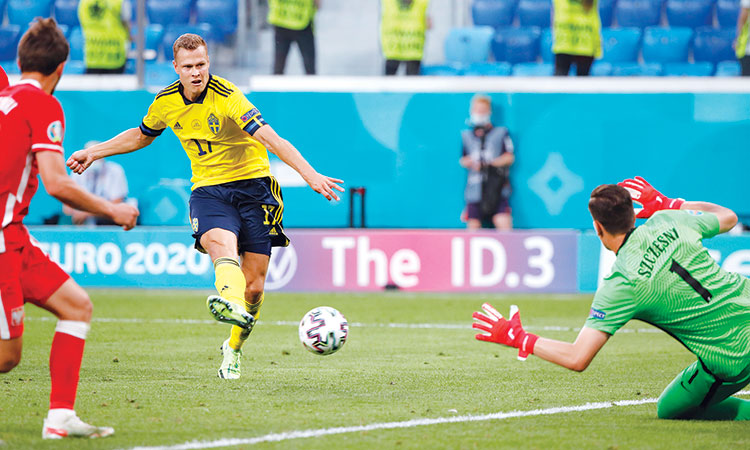 Spain thrash Slovakia, enter knockouts; Claesson hits late winner for Sweden