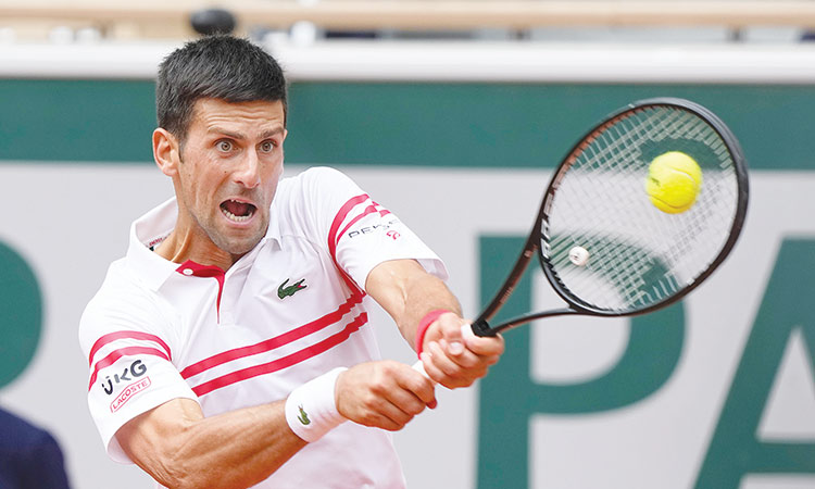 Djokovic survives, Nadal cruises at French Open