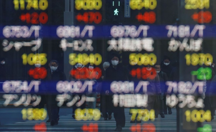 Asian stocks skid, bond yields up after hawkish Fed comments