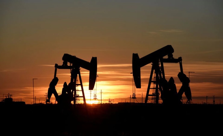 Oil slides on strong dollar and weaker demand outlook