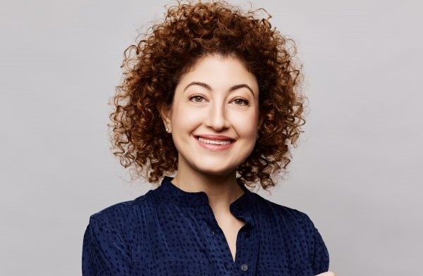 How is Dubai booming from a hotel’s profitability point of view and how is Crowne Plaza Dubai Marina faring as a result of the boom? 