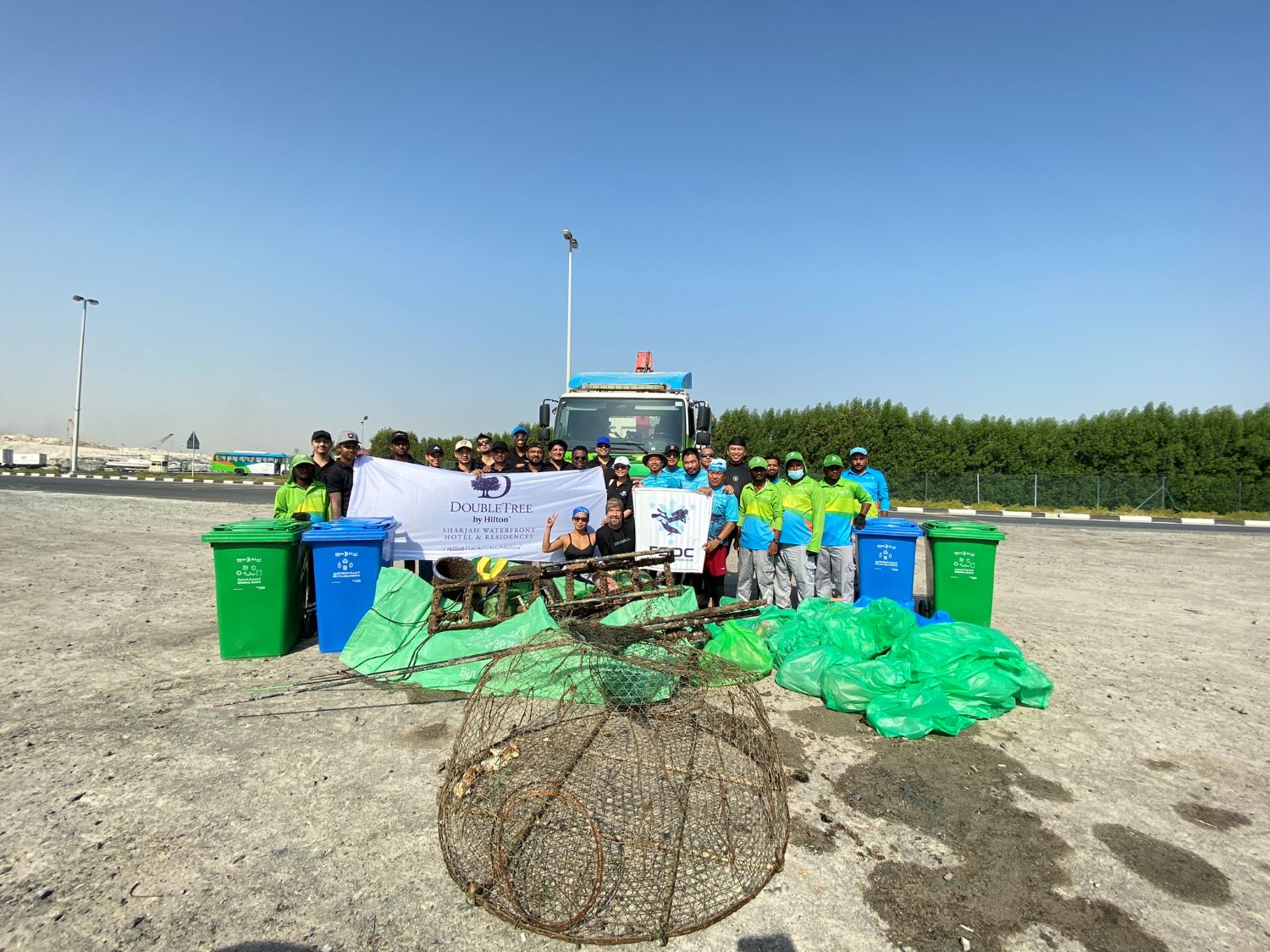 DoubleTree by Hilton Sharjah Waterfront Hotel & Residences Celebrates World Ocean Day with Underwater and Shoreline Cleanup Campaign